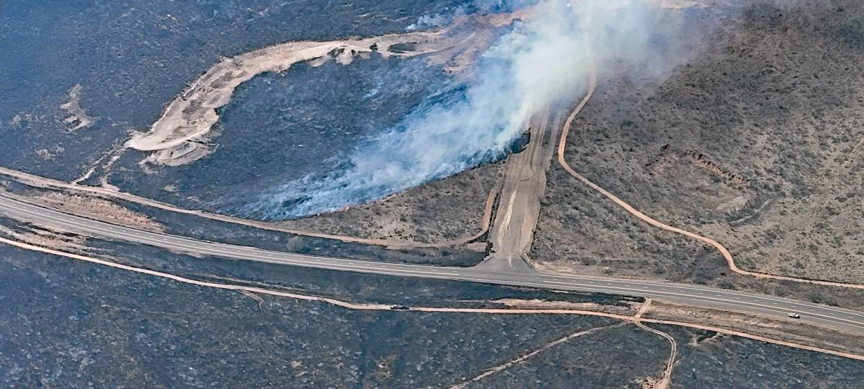 Fire from the Windy Deuce Fire in open fields burning between Fritch and Amarillo along Hwy. 136 could still be seen from the air as of Wednesday afternoon, Feb. 28, 2024. The highway remained closed as first responders continued to battle the blaze, one of five active wildfires in the Texas Panhandle.