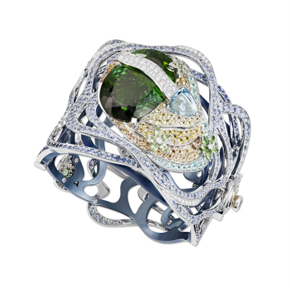 Lorenz Bäumer’s Titane Ile au Trésor bracelet featuring a 55-carat green tourmaline. - Credit: Courtesy of Lorenz Bäumer