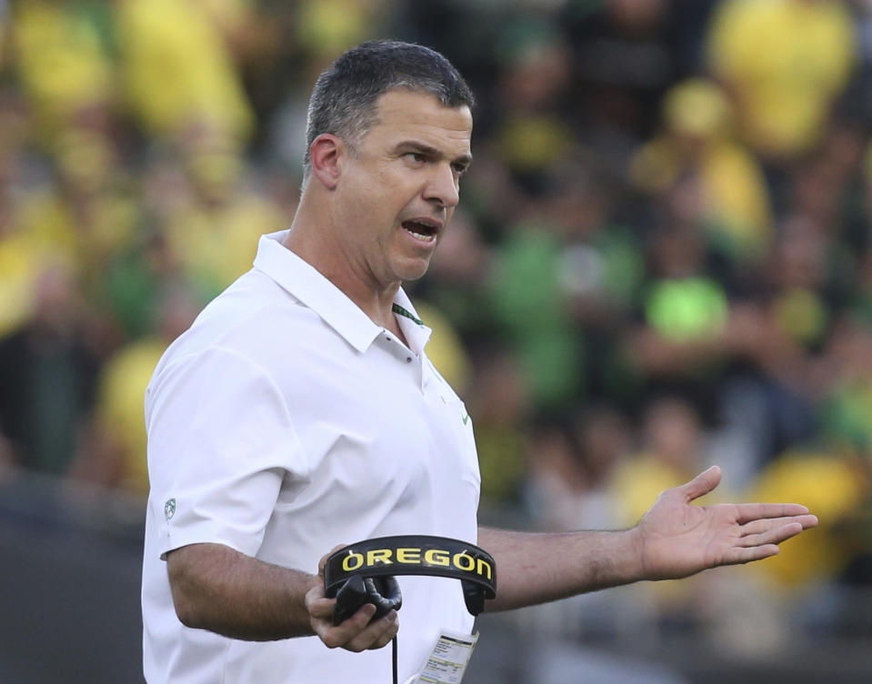 Would Mario Cristobal leave Oregon for his alma mater Miami? (AP)