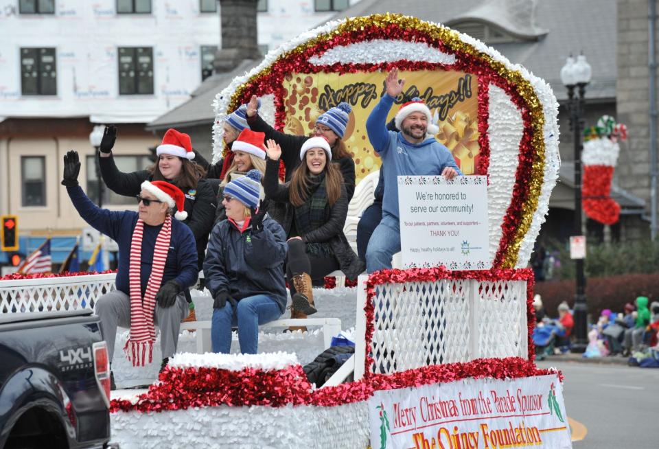 The Quincy Foundation float passes by during the Quincy Christmas Parade on Sunday, Nov. 28, 2021.