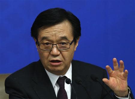 China's Commerce Minister Gao Hucheng speaks during a news conference as a part of the National People's Congress (NPC) in Beijing March 7, 2014. REUTERS/Kim Kyung-Hoon