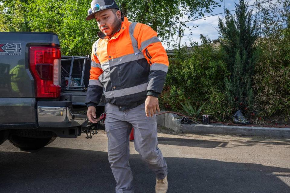 Daniel Mejia, of Stockton, prepares to go to work in April. Mejia said that he hopes to recover more than $20,000 he said that is owed to him from a Sacramento company that used his services and that of other friends.