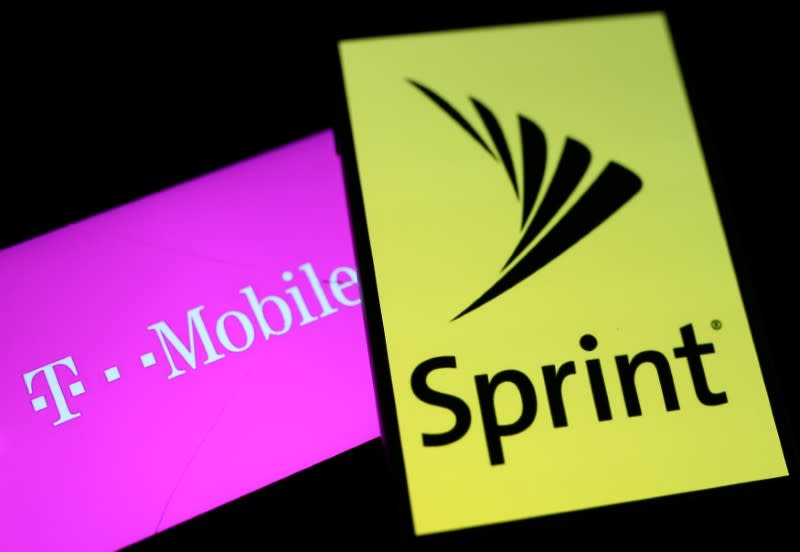 FILE PHOTO: Smartphones with the logos of T-Mobile and Sprint are seen in this illustration taken September 19, 2017. REUTERS/Dado Ruvic/Illustration