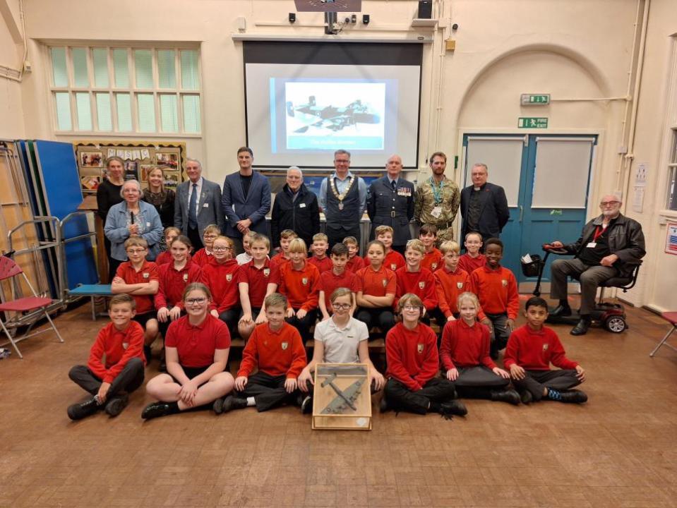 Darlington and Stockton Times: Staff, pupils and guests at the Applegarth School event, including right, Jim Sedgwick, and left, in blue cargidan, Joan Haslam