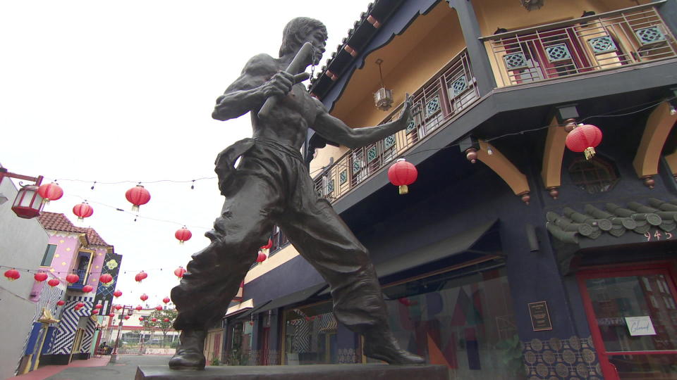 A seven-foot-tall bronze statue of Bruce Lee, in Los Angeles' Chinatown.  / Credit: CBS News