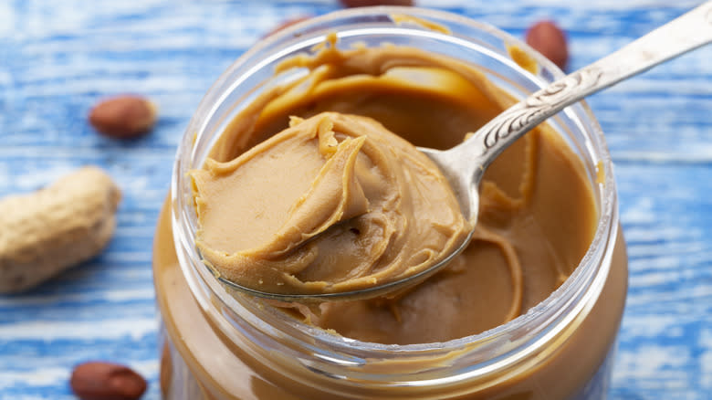 jar of peanut butter with spoon