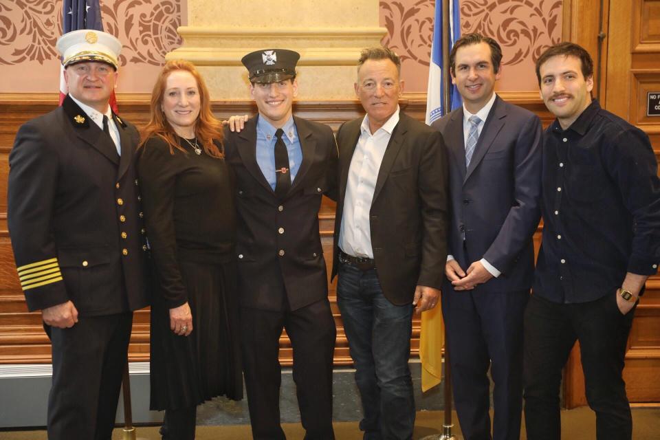 Sam Springsteen with his parents and Jersey City Mayor Steven Fulop.