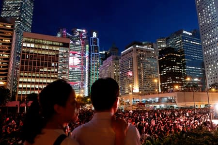 Demonstrators attend a rally ahead of the G20 summit, urging the international community to back their demands for the government to withdraw a the extradition bill in Hong Kong