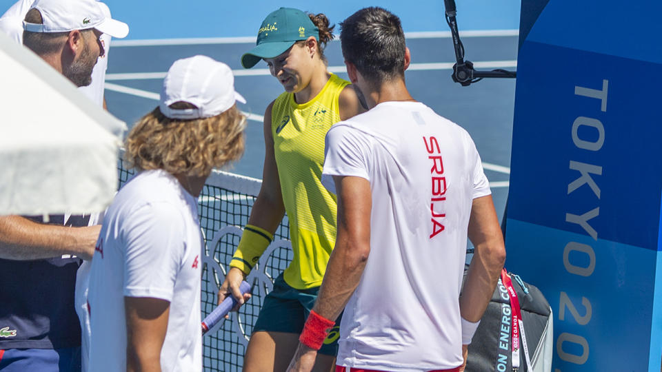 Ash Barty and Novak Djokovic, pictured here on the practice court at the Tokyo Olympics.