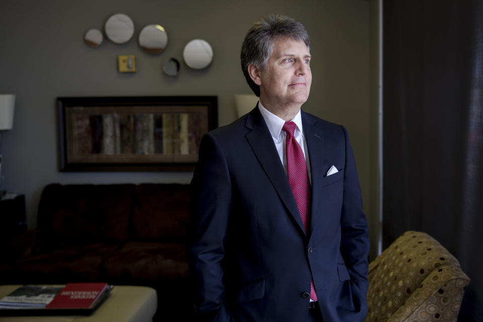 In this July 25, 2018, photo, Stephen Bell, president and CEO of the Arkadelphia Area Chamber of Commerce, poses for a photo in Arkadelphia, Ark. State and local officials in Arkansas are scrambling to preserve development deals with Chinese companies amid President Donald Trump's escalating tariff battle. "It's like a dark cloud hanging over the future of the project," Bell said. "Right now, the clouds are off on the horizon. But I think no one knows where the trade situation is going right now." (AP Photos/Karen E. Segrave)