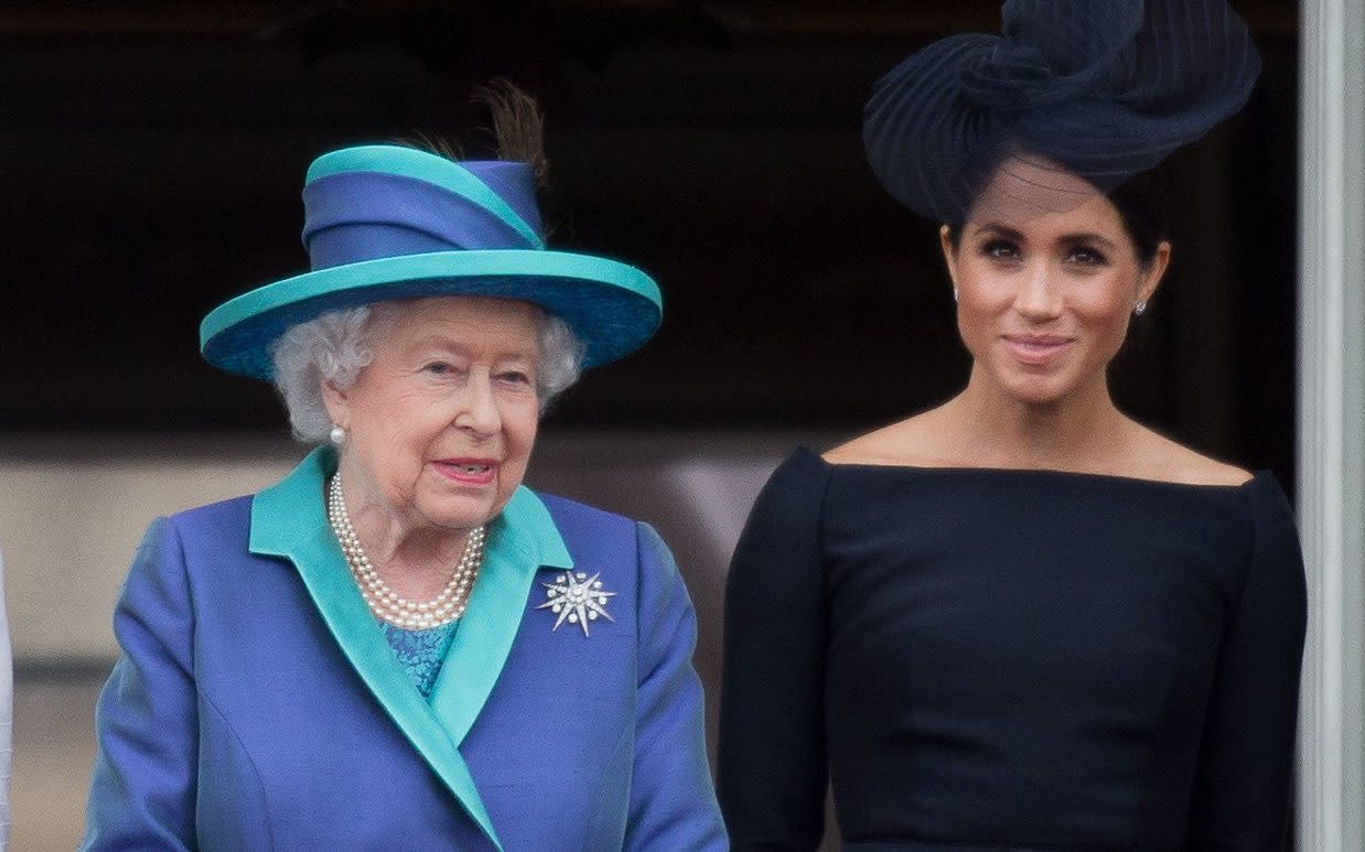 The Queen and the Duchess of Sussex at the 100th anniversary of the RAF in 2018 - Kelvin Bruce