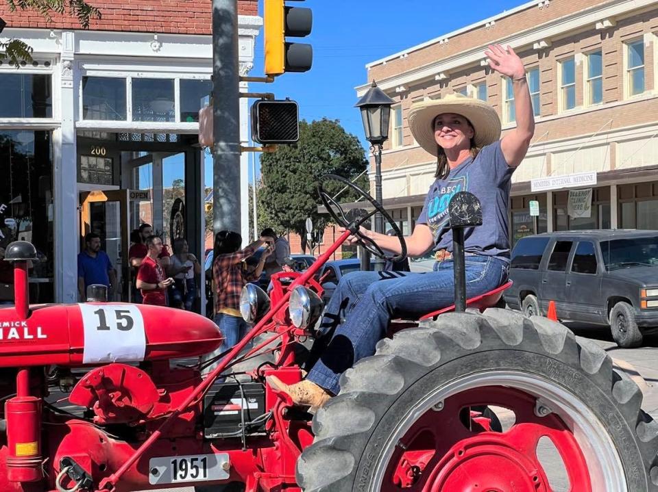 New Mexico state Rep. Rebecca Dow, a Republican candidate for governor in 2022, participates in a parade in downtown Deming on Saturday, Oct. 9, 2021.