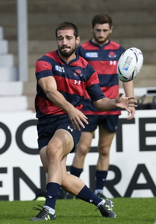 Georgia's captain Merab Sharikadze passes the ball during a training session in Gloucester, England, in 2015