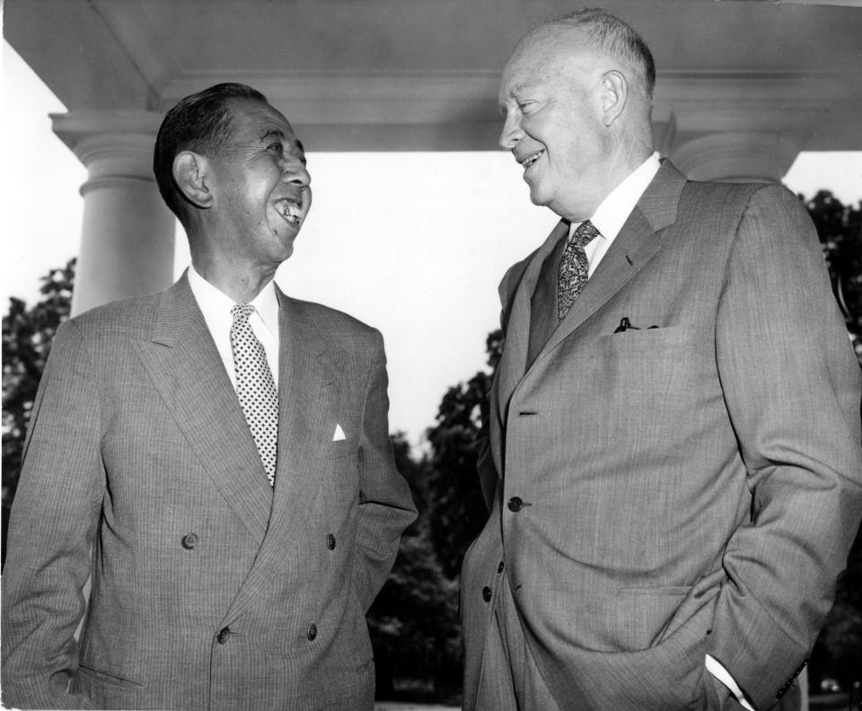 President Eisenhower and Japanese Prime Minister Kishi engage in small talk during their farewell meeting at the White House, June 21, 1957. (AP Photo)