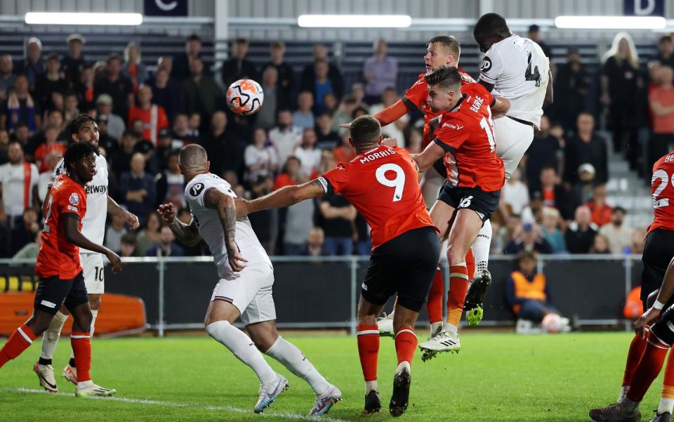Kurt Zouma of West Ham United scores the team's second goal during the Premier League match between Luton Town and West Ham United at Kenilworth Road on September 01, 2023 in Luton, England