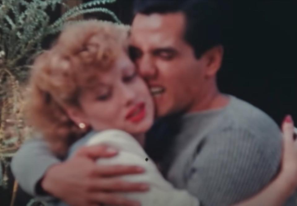 Lucy and Desi embrace, and he jokingly nibbles at her face in the "Lucy and Desi" trailer