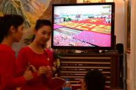 At Dubai restaurant Okryu-gwan, a flatscreen television tuned to a North Korean channel streams military propaganda clips, but offers no hint of the escalating tensions between Washington and Pyongyang