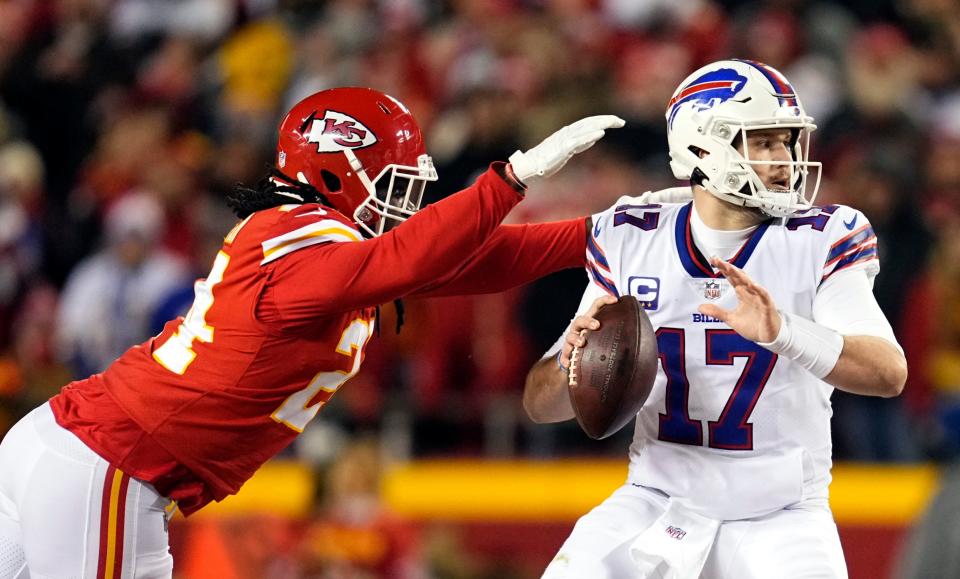 Melvin Ingram pressures Bills QB Josh Allen in the playoffs last season.