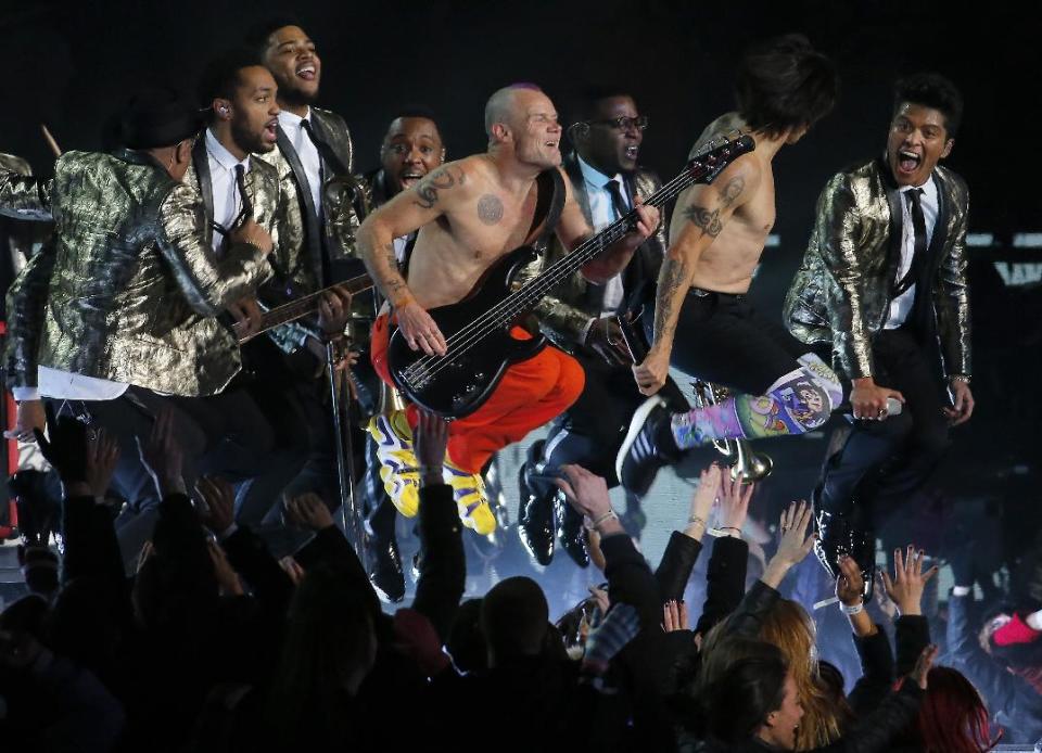 The Red Hot Chili Peppers and Bruno Mars perform during the halftime show of the NFL Super Bowl XLVIII football game between the Seattle Seahawks and the Denver Broncos Sunday, Feb. 2, 2014, in East Rutherford, N.J. (AP Photo/Matt York)