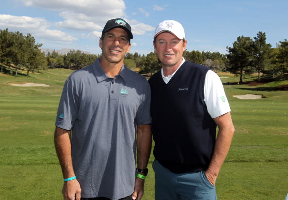 NORTH LAS VEGAS, NV - APRIL 05: Former NHL players Wayne Gretzky (R) and Chris Chelios attend Aria Resort & Casino's 13th Annual Michael Jordan Celebrity Invitational at Shadow Creek on April 5, 2014 in North Las Vegas, Nevada. (Photo by Isaac Brekken/Getty Images for Michael Jordan Celebrity Invitational)