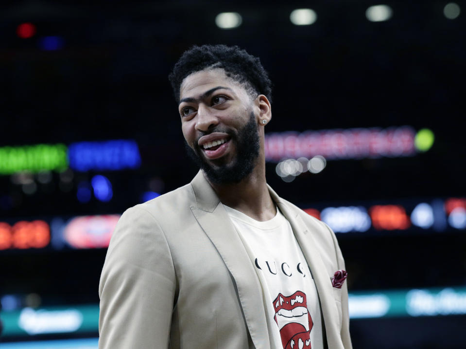 FILE - In this Feb. 2, 2019, file photo, New Orleans Pelicans forward Anthony Davis (23) smiles during the second half of an NBA basketball game against the San Antonio Spurs, in San Antonio. Only a few hours remain to determine if the Anthony Davis saga ends for this season or lingers into the summer. The NBA trade deadline is Thursday, Feb. 7, 2019, at 3 p.m. EST, and Davis is still seeking a trade from the New Orleans Pelicans.(AP Photo/Eric Gay, File)