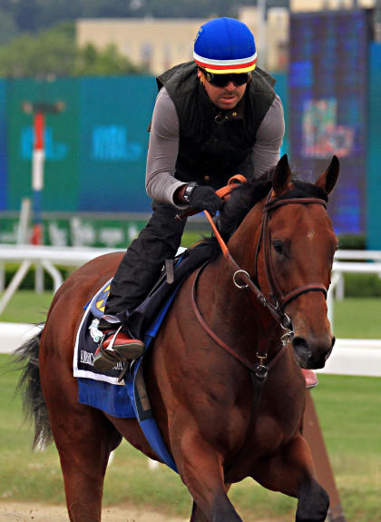 American Pharoah exercises at Belmont Park on Thursday. (AP)