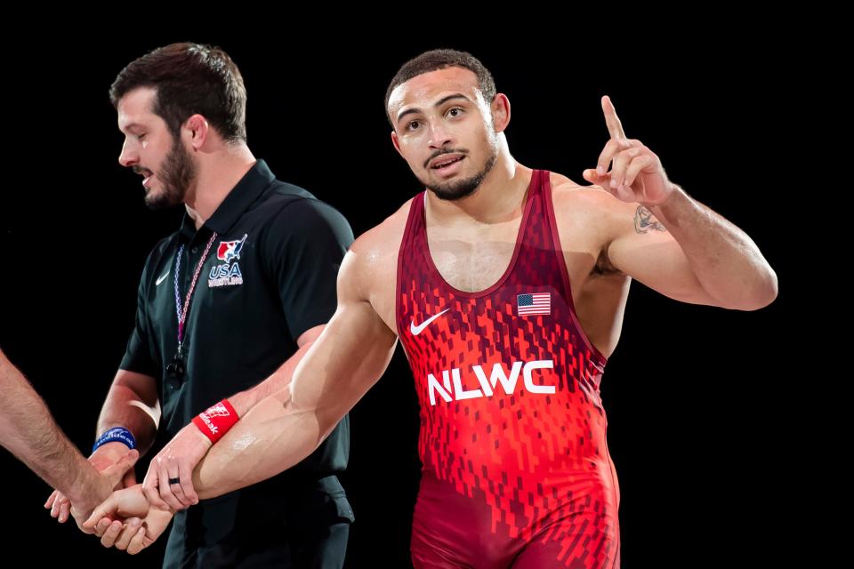 Aaron Brooks celebrates after defeating David Taylor in the 86 kilogram best-of-three championship series during the U.S. Olympic Team Trials at the Bryce Jordan Center April 20, 2024, in State College. Brooks won the series, 2-0.