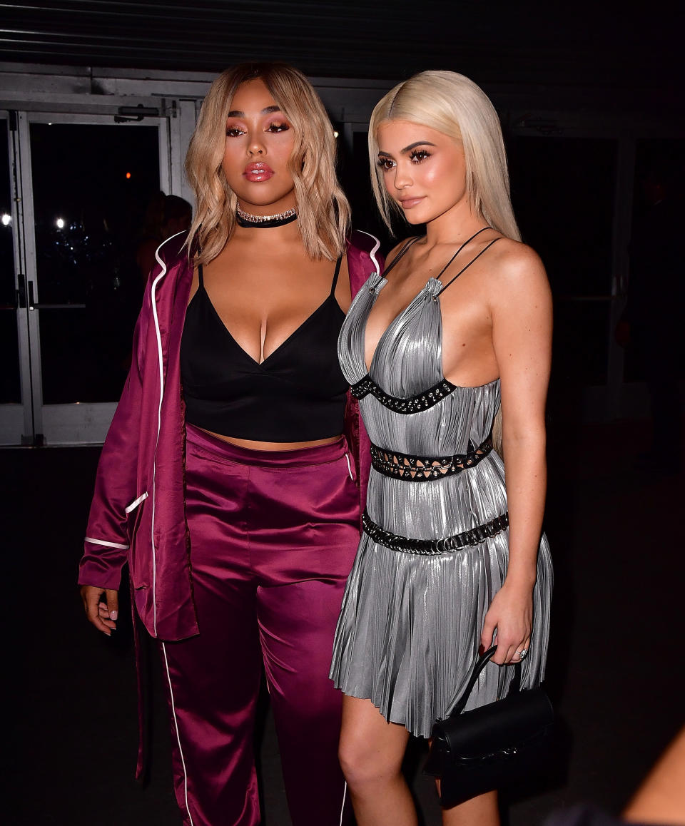 Jordyn Woods and Kylie Jenner at an Alexander Wang fashion show at New York Fashion Week in 2016.  (James Devaney via Getty Images)