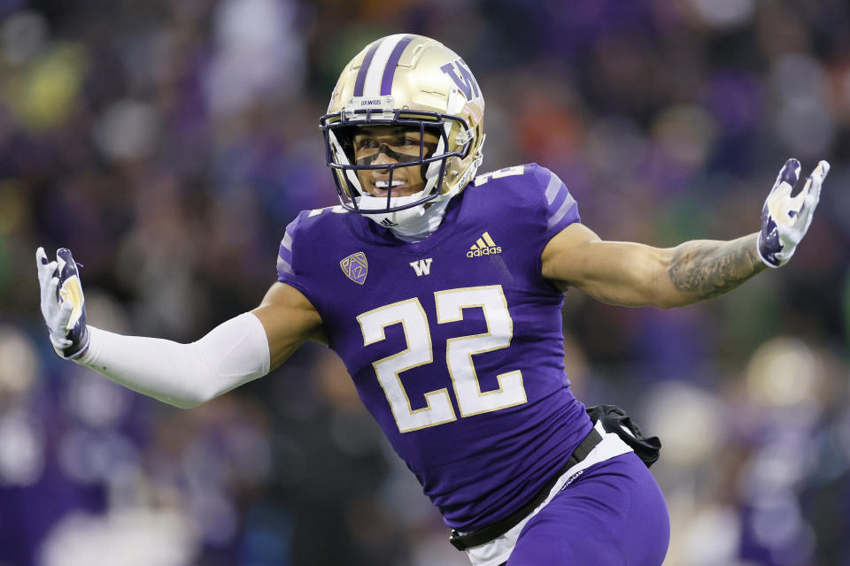 SEATTLE, WASHINGTON - NOVEMBER 06: Trent McDuffie #22 of the Washington Huskies celebrates a safety against the Oregon Ducks during the first quarter at Husky Stadium on November 06, 2021 in Seattle, Washington. (Photo by Steph Chambers/Getty Images)