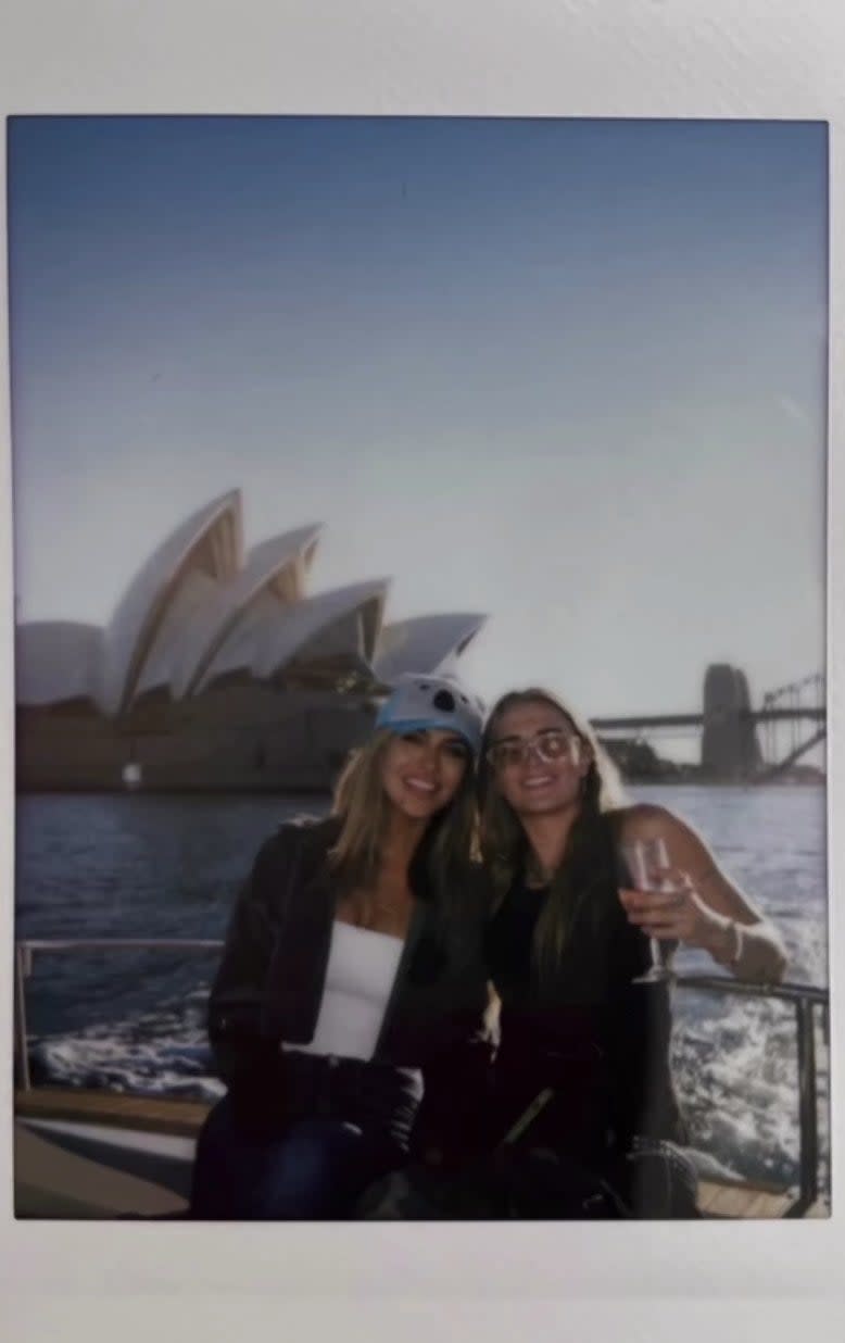 A polaroid photo of the pair in front of the Sydney Opera House shared in the video