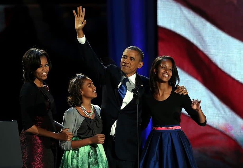 <p>Michelle and Barack Obama with their daughters Sasha and Malia in Chicago.</p> (Win McNamee/Getty Images)