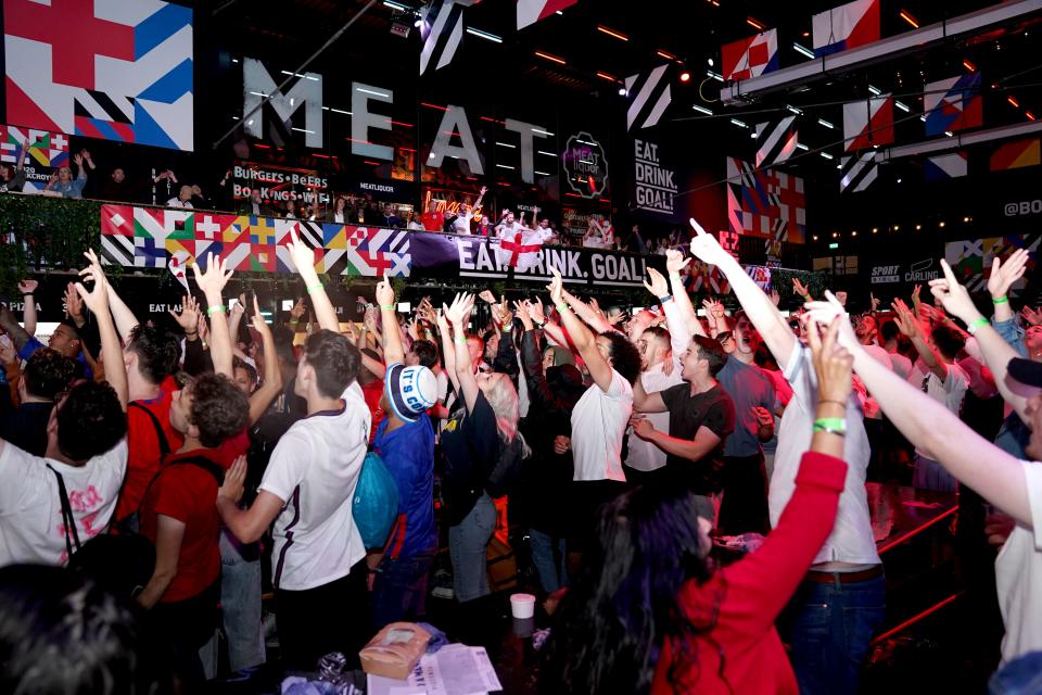 Fans watching England v Denmark (PA Wire)