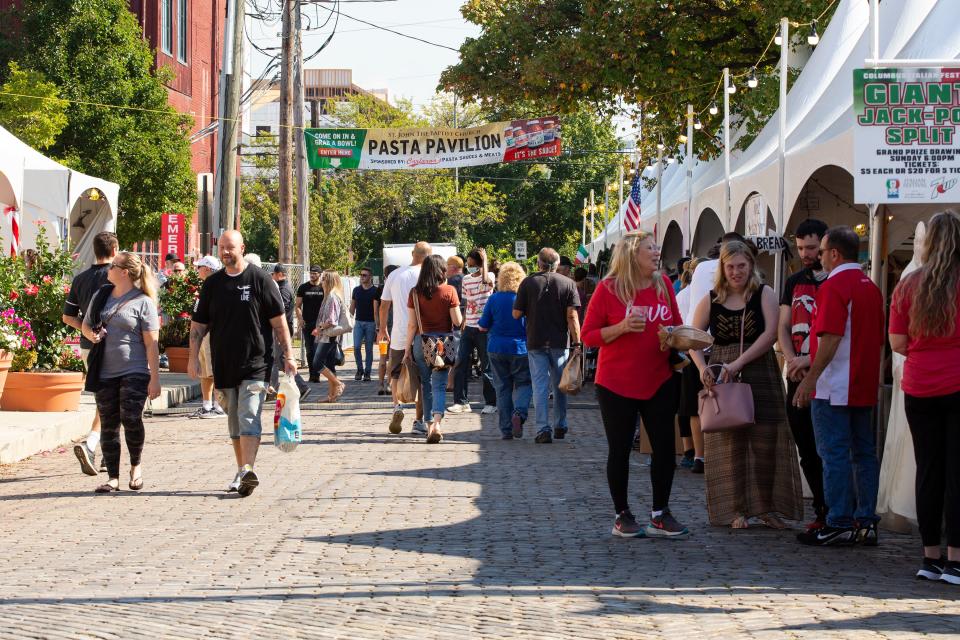 Visitors enjoy the Italian Festival last year at St. John the Baptist Catholic Church.