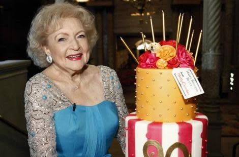 Betty White celebrates her 90th birthday with a custom Betty Crocker cake.