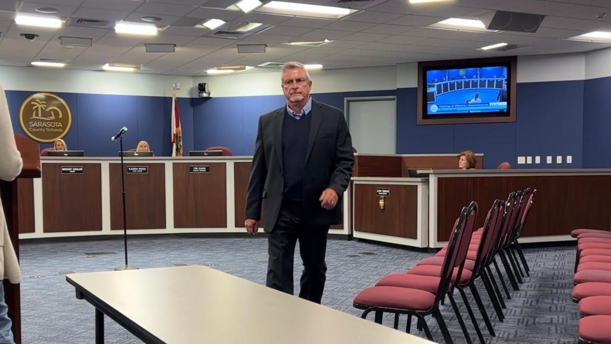 Tom Edwards walks out of Tuesday's Sarasota School Board meeting amid ongoing homophobic public comments.