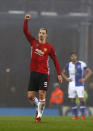 Manchester United's Zlatan Ibrahimovic celebrates scoring his side's second goal against Blackburn Rovers during the English FA Cup, fifth round soccer match at Ewood Park, Blackburn, England, Sunday Feb. 19, 2017. (Martin Rickett/PA via AP)