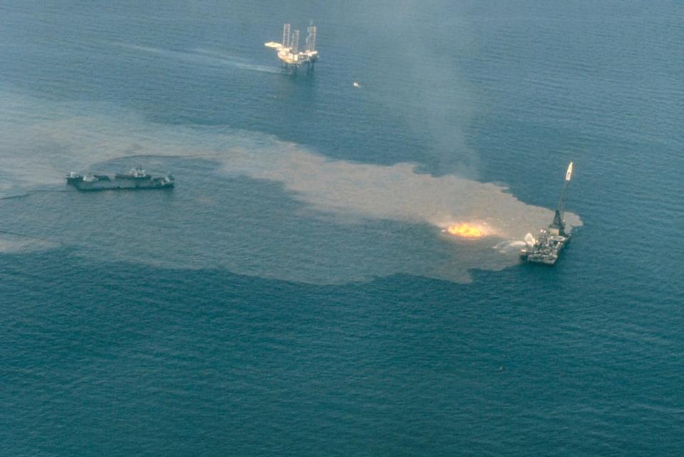 Ixtoc I oil well blowout — after the platform Sedco 135 burns and sinks in the Bay of Campeche, Mexico.