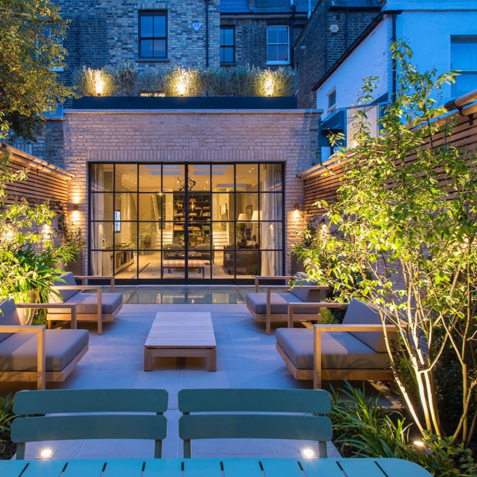 garden with lighting and glass door