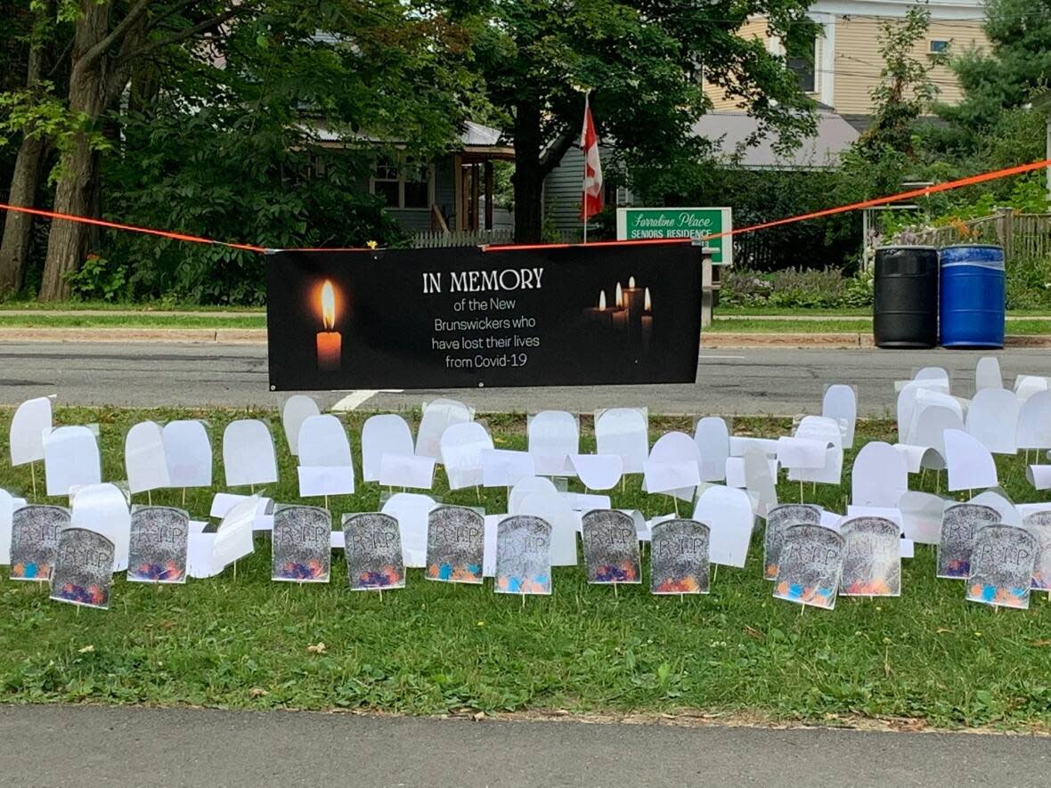 The group installed 443 headstones, one for each reported COVID-19 death at the time of the memorial.  (Submitted by the New Brunswick COVID Memorial Project - image credit)