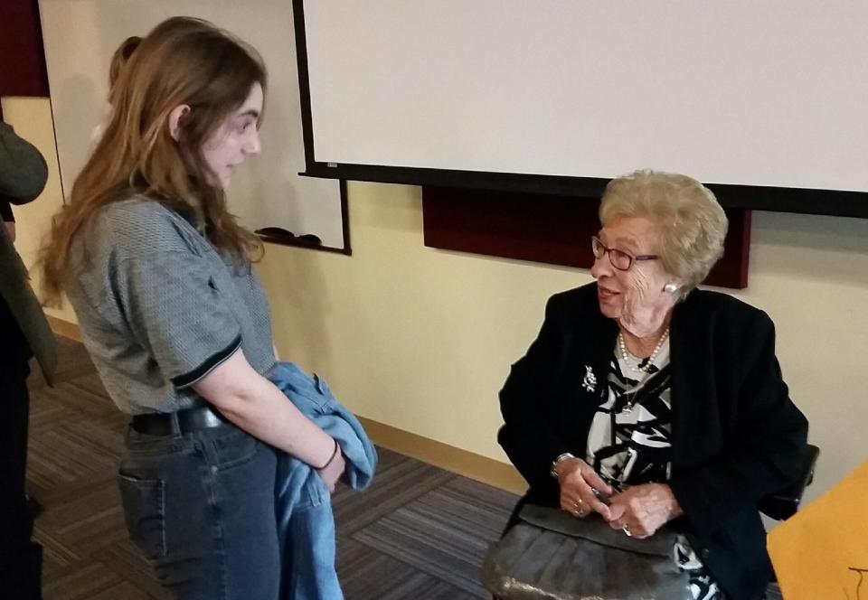 Emilie Rasmussen, left, a New Mexico State University student in industrial engineering, talks on March 17, 2019, with Holocaust survivor Eva Schloss, the stepsister of Anne Frank, after Schloss addressed an audience of about 540 people.