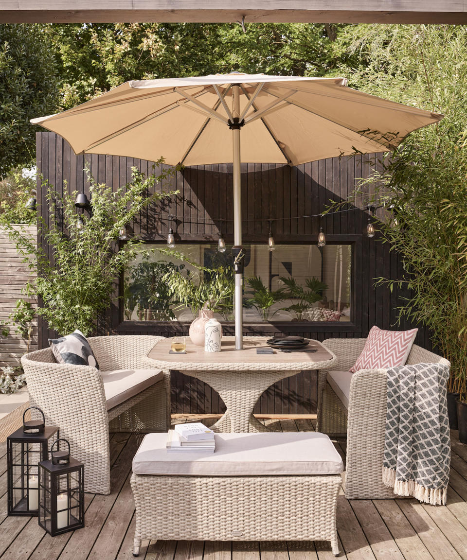 outdoor furniture and parasol on a patio