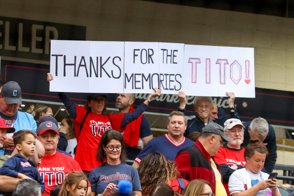 CLEVELAND, OH - SEPTEMBER 27: Fans hold signs honoring Cleveland Guardians manager Terry Francona (77) prior to the Major League Baseball Interleague game between the Cincinnati Reds and Cleveland Guardians on September 27, 2023, at Progressive Field in Cleveland, OH. Francona is retiring at the end of the season. (Photo by Frank Jansky/Icon Sportswire via Getty Images)