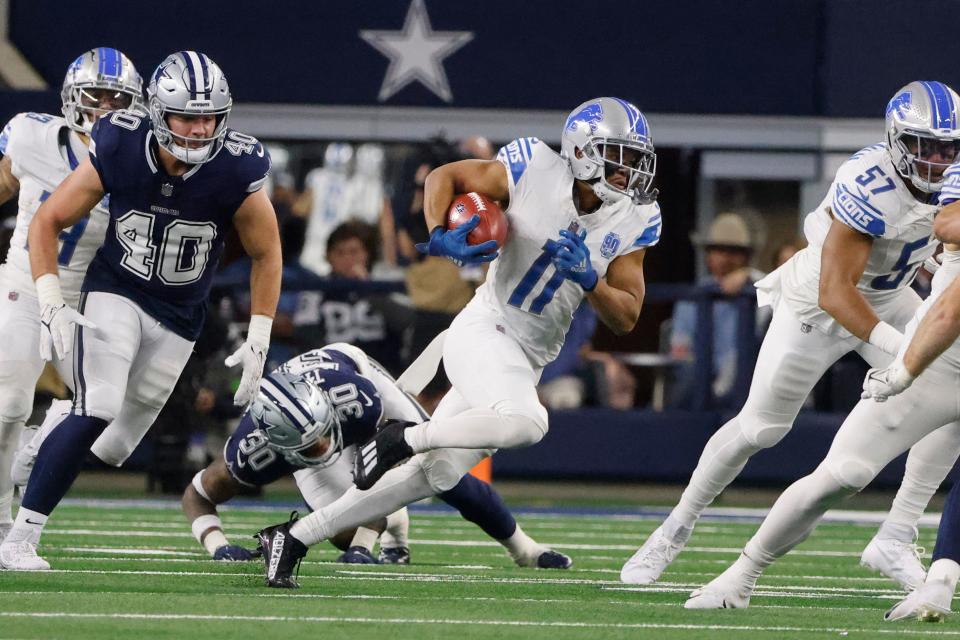 Detroit Lions wide receiver Kalif Raymond returns a kick.