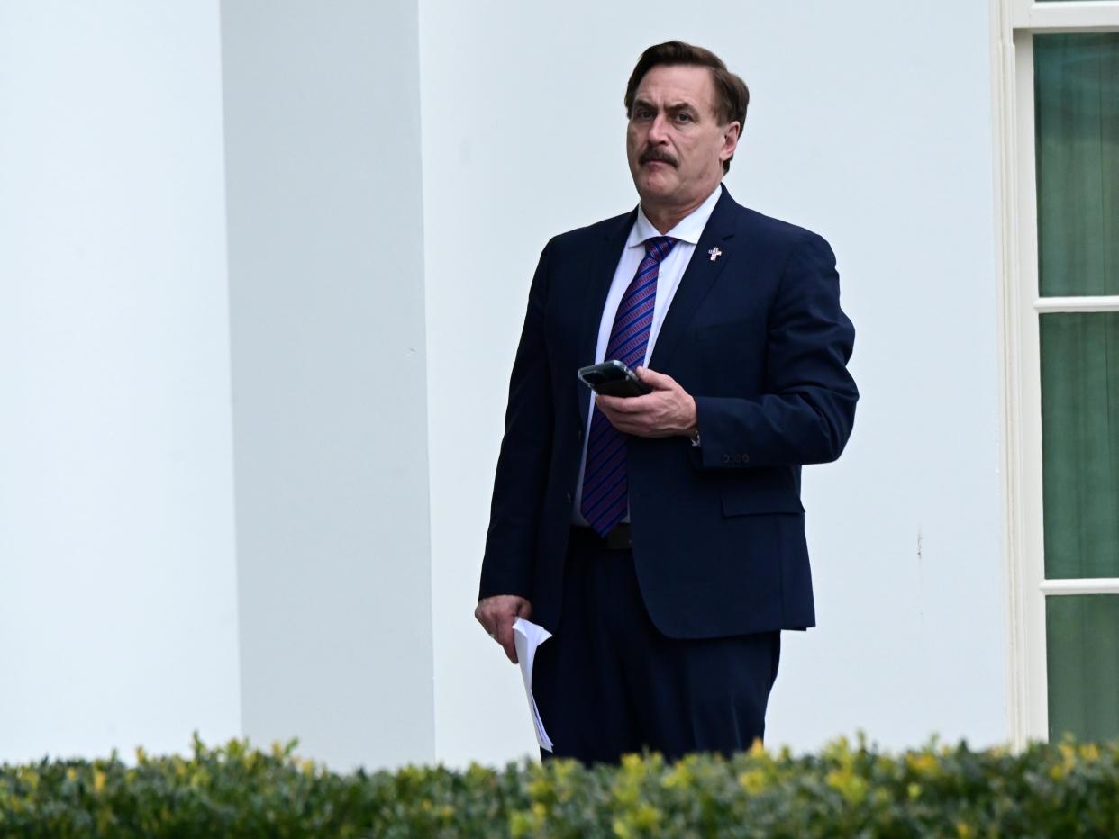 <p>Mike Lindell, CEO of My Pillow, stands outside the West Wing of the White House in Washington, US, 15 January, 2021</p> (REUTERS)