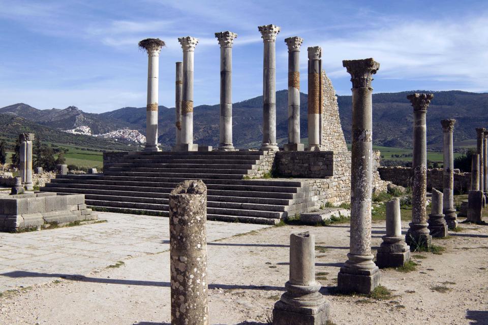 This Thursday, March 8, 2012 photo shows the pillars of the ruined Capitol, once a temple to Jupiter in the ancient Roman city of Volubilis near Meknes, Morocco. (AP Photo/Abdeljalil Bounhar)