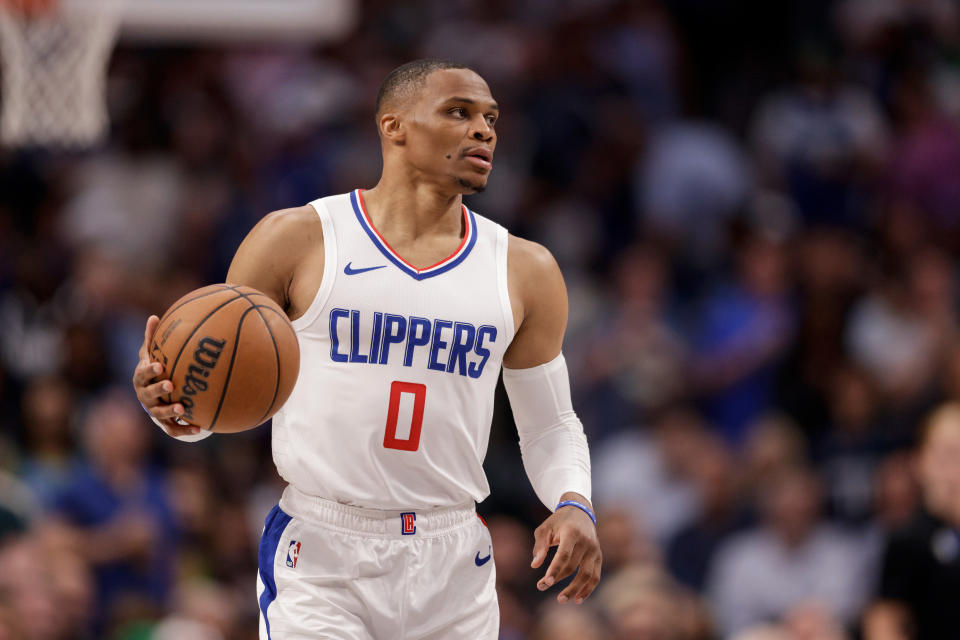 DALLAS, TEXAS - APRIL 28: Russell Westbrook #0 of the Los Angeles Clippers brings the ball up court in the second half of game four of the Western Conference First Round Playoffs against the Dallas Mavericks at American Airlines Center on April 28, 2024 in Dallas, Texas. NOTE TO USER: User expressly acknowledges and agrees that, by downloading and or using this photograph, User is consenting to the terms and conditions of the Getty Images License Agreement. (Photo by Tim Warner/Getty Images)