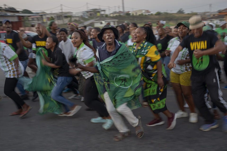 MK Party supporters celebrate in the middle of the street in Mahlbnathini village in rural KwaZulu-Natal, South Africa, on Thursday May 30, 2024. MK Party is currently leading in the provincial poll against the ANC, who've held the stronghold in the province for the last 20 years. (AP Photo/Emilio Morenatti)