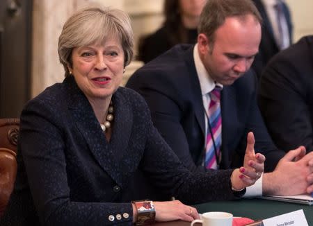 Britain's Prime Minister Theresa May hosts a roundtable meeting with house builders at 10 Downing Street, London, Britain, October 17, 2017. REUTERS/Steve Parsons/Pool