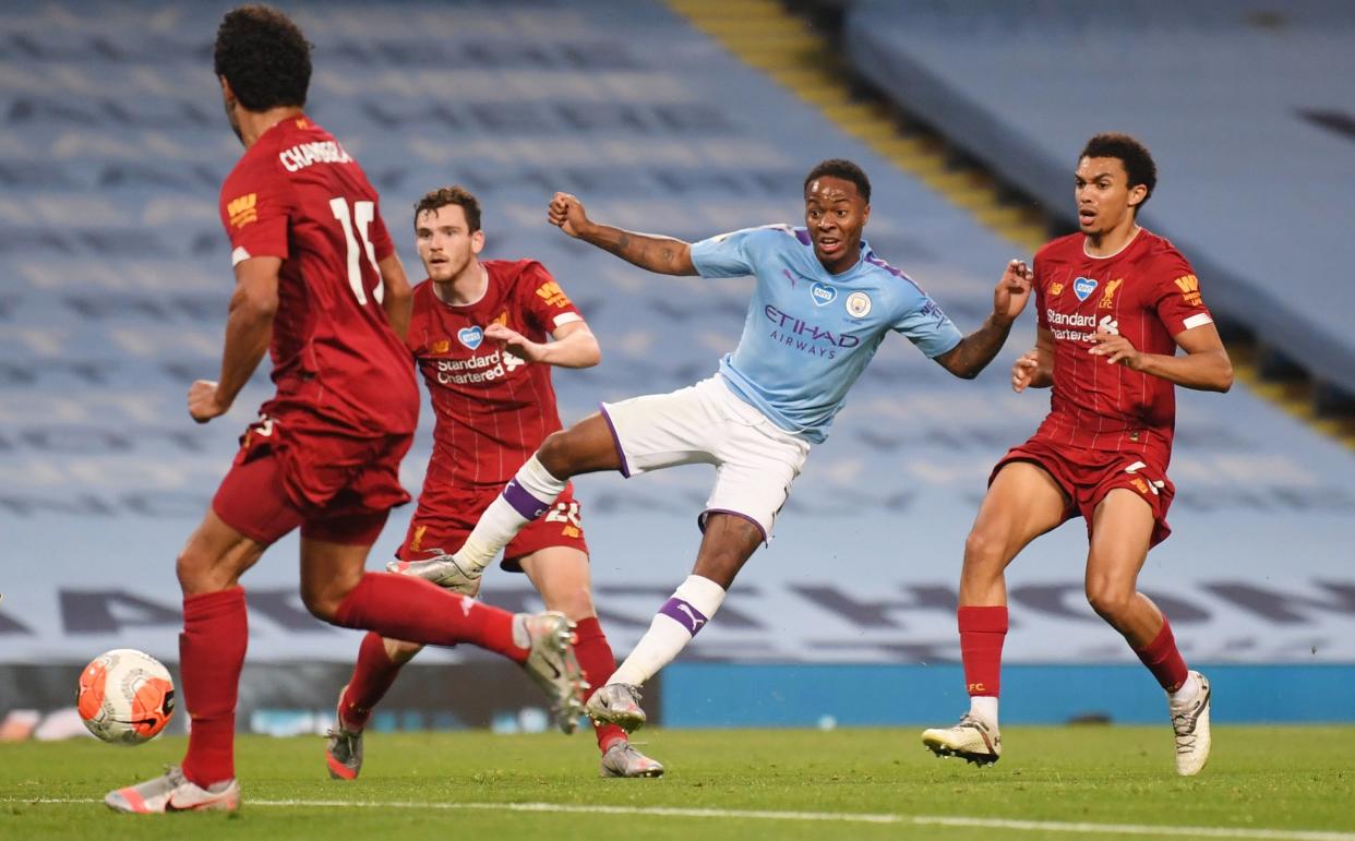 Manchester City's Raheem Sterling scores against Liverpool in their Premier League encounter last season.