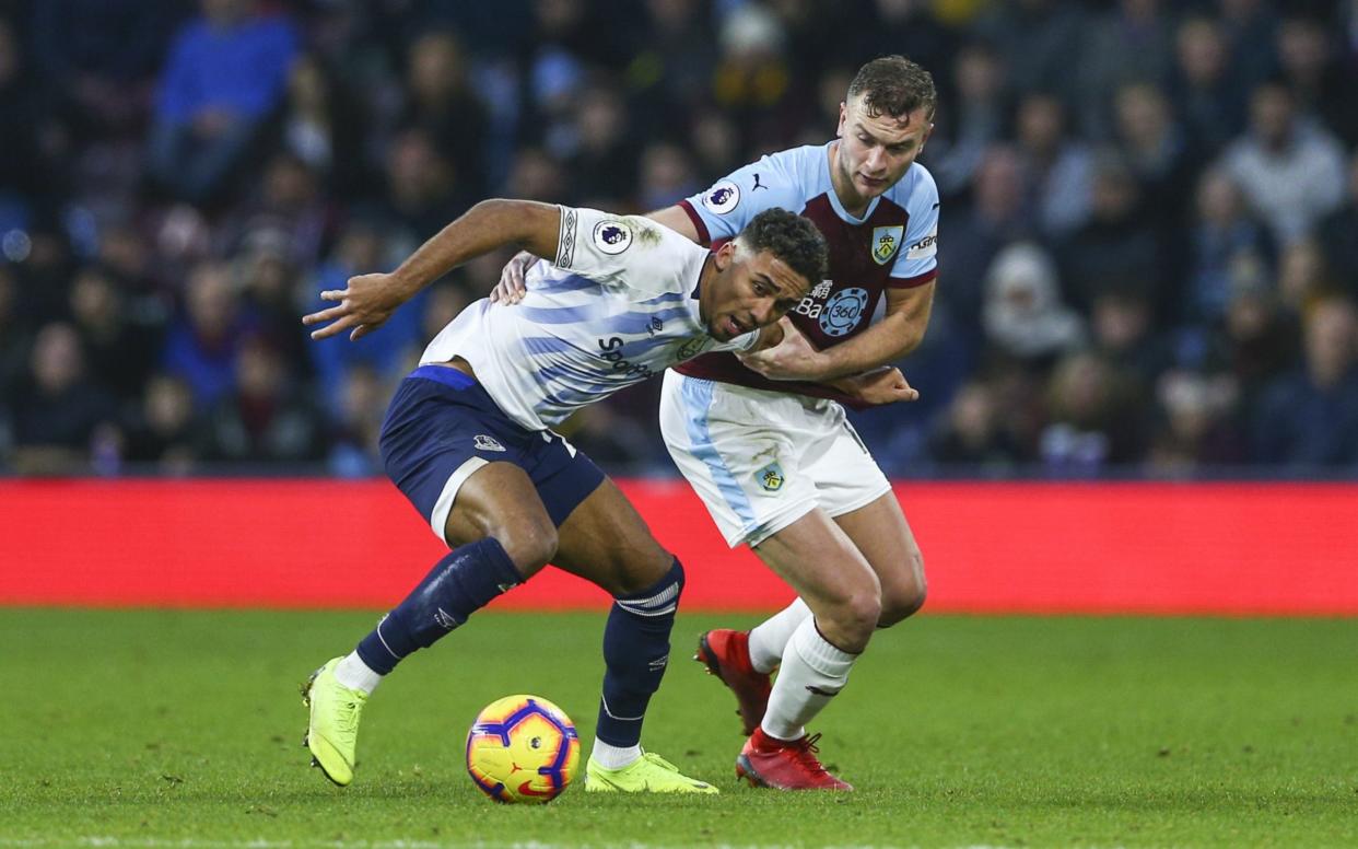 Premier League football, Burnley versus Everton; Dominic Calvert-Lewin of Everton holds off a challenge from Ben Gibson of Burnley - Lee Parker/Action Plus via Getty Images